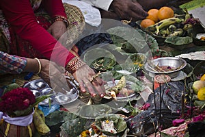Hindu religious ceremony with Ã¢â¬â¹Ã¢â¬â¹offerings and photo